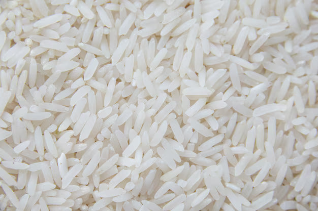 A 15 kg bag of fragrant Jasmine rice from Papagino Foods Inc., showing the rice grains with a focus on the packaging.