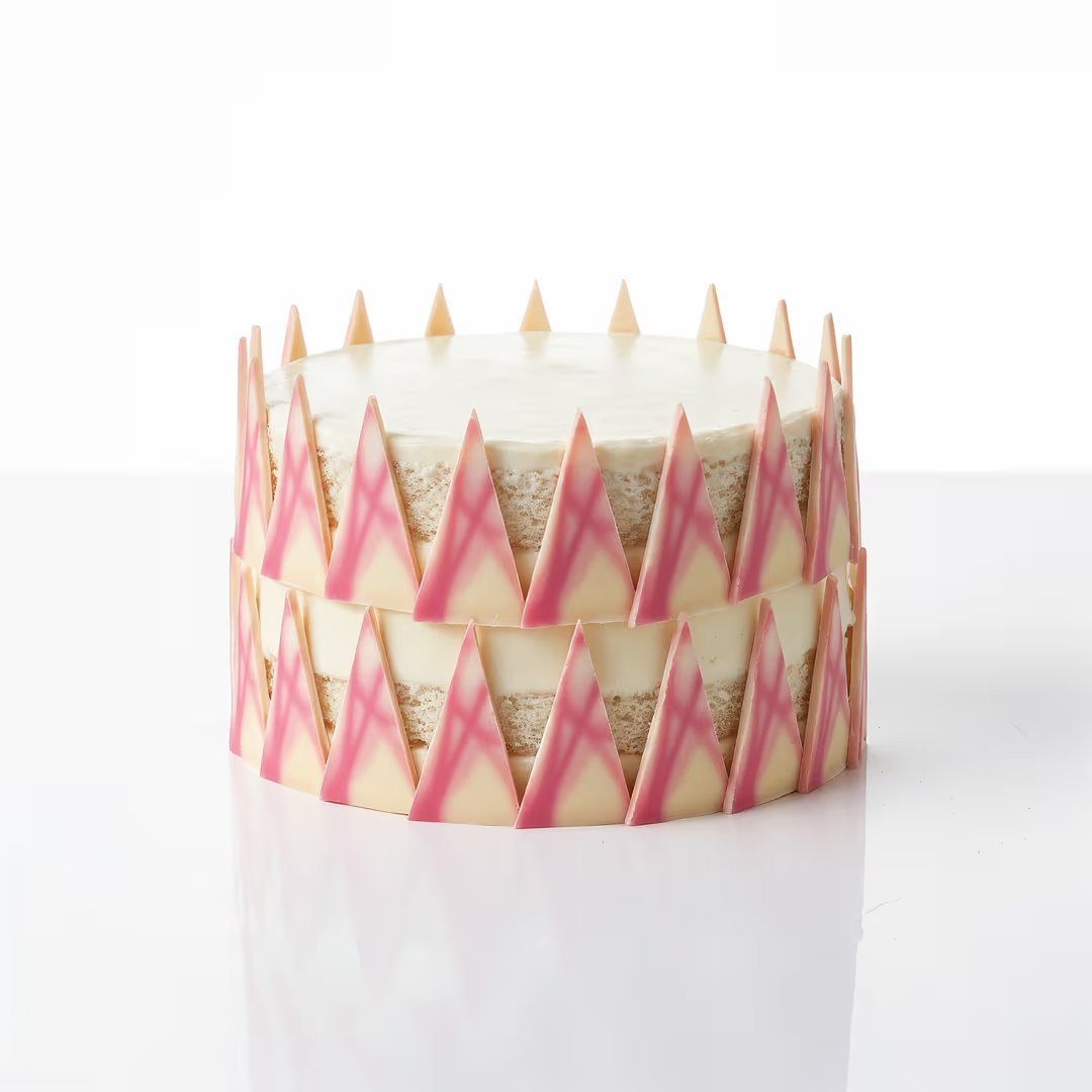 Pink patterned triangle-shaped candies from Papagino Foods Inc., 1 kg, 435 pieces, colorful and decorative snack treat.