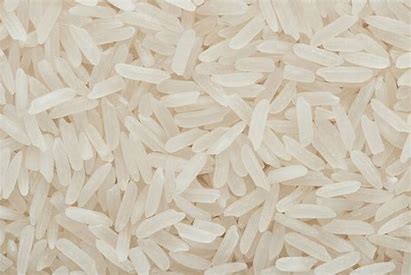 Premium Parboiled Rice by Papagino Foods Inc., 20 kg bag showing white rice grains ready for cooking.