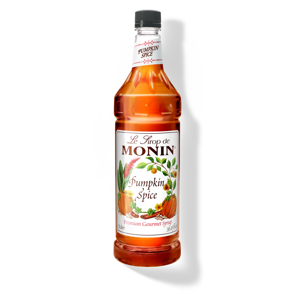 Monin Pumpkin Spice Premium Syrup in PET bottle, featuring a clear label with pumpkin spice flavor and brand logo.