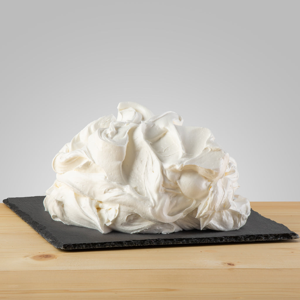 Creamy Gelato D'Autunno gelato mousse from Papagino Foods Inc. in a smooth, textured dessert with rich autumnal flavors.