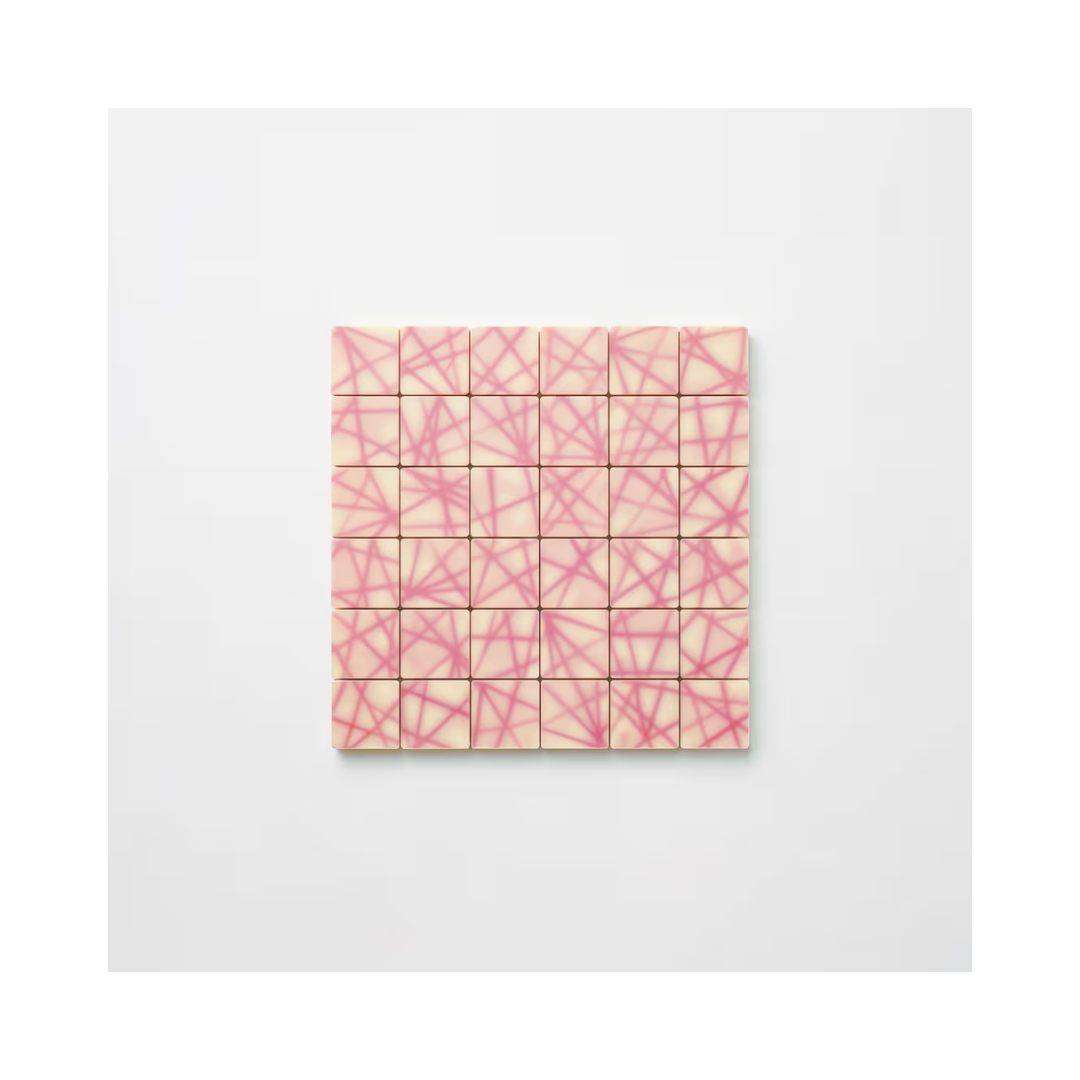 Pink patterned square candies from Papagino Foods Inc., 1.2 kg box with 350 pieces, ideal for snacks and celebrations.