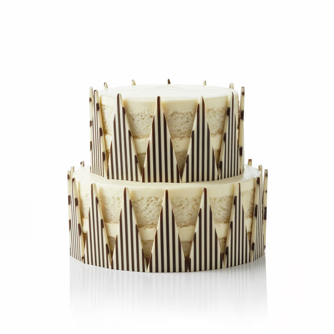 Barlo striped triangle candies by Papagino Foods Inc., 1 kg box containing 435 colorful candies arranged in a pile.
