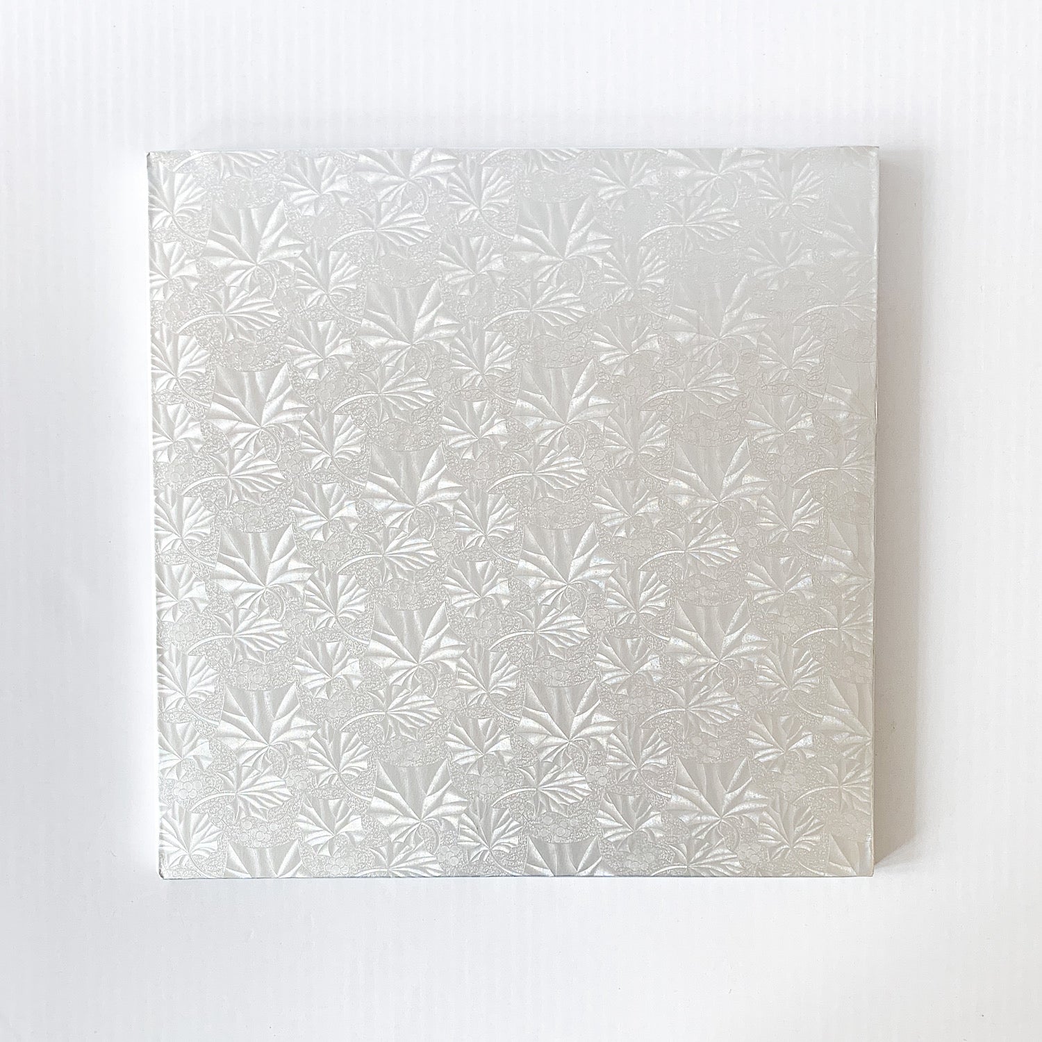 10" Square Silver Cake Board Embossed 1/2" - Papagino Foods Inc.